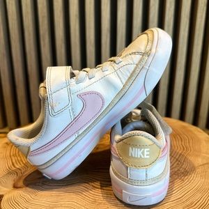 Girls easy on/off Nike sneakers.
